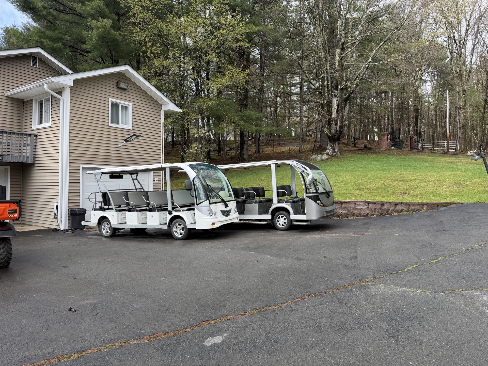 Electric golf cart shuttles used for touring the private estates at Hampton Resort Estate